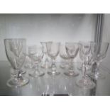 A collection of twelve 18th century and later drinking glasses, tallest 13cm, all in good condition
