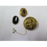 A hallmarked 9ct gold oval inset brooch and two gilt brooches, one brooch has old test mark, largest