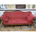 A Victorian scroll arm double ended mahogany chaise longue on turned legs, 97cm tall x 213cm wide