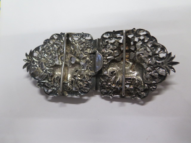 An Eastern silver nurses buckle, approx 1.49 troy oz, some slight bending but generally good - Image 2 of 2