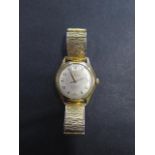 A Georges Beguelin 25 jewel automatic gents wristwatch on a sprung strap, not running, some