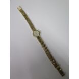 A hallmarked 9ct gold ladies Bueche Girod ladies quartz wristwatch, 18mm case, 20.5 cm long, some