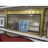 A 19th century repainted gilt over mantle mirror, 124cm x 66cm, with some small losses