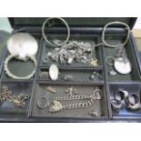 A silver compact, silver charm bracelet and assorted silver and other jewellery, total weight approx