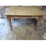 A Victorian stripped pine kitchen table with a drawer, 74cm x 122cm x 87cm, in sturdy condition