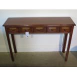 A five drawer mahogany hall table made by a local craftsman to a high standard, 76cm tall x 107cm