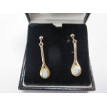 A pair of 9ct gold opal earrings 2.5cm long, approx 2.4 grams, in good condition