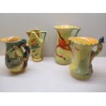 Four Burleigh ware pottery jugs; Pied Piper, 22cm tall; Dick Turpin, 20cm tall, one relief moulded