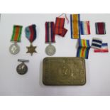 A WWI medal to 64847 Gus H Tucker RA, A WWI Princess Mary Tin, three WWII medals assorted ribbons