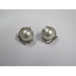 A pair of 18ct white gold diamond and pearl earrings, 22mm wide, approx 15.8 grams, in good