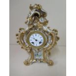 A 19th century porcelain French clock by Henri Marc of Paris, 8 day movement with silk suspension,