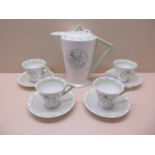 A Shelley part tea service with triangular handles 4 cups 4 saucers and a coffee pot - some