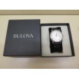 A Bulova gents watch with quartz movement in original box with Bulova strap and buckle, 40mm case