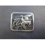 A Georg Jensen sterling silver brooch of a duck in flight, no; 300, 47mm wide, in generally good