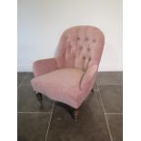 A Victorian button back fireside chair, recently reupholstered, 87cm tall x 74cm wide x 75cm deep