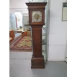 An oak 8 day striking longcase clock with an 11" brass dial signed Richard Weller Eastbourne, 73"