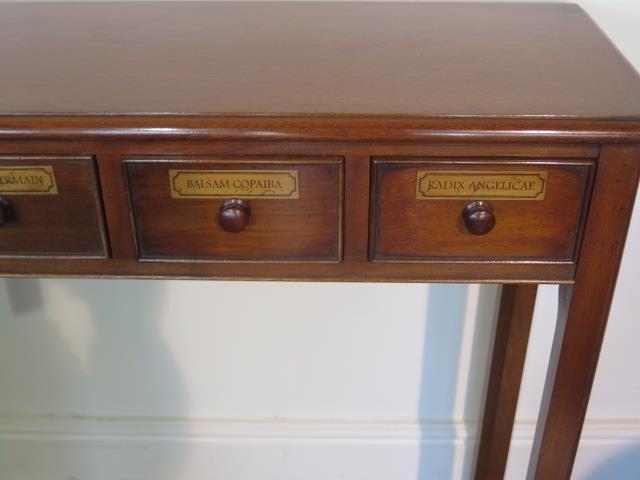 A five drawer mahogany hall table made by a local craftsman to a high standard, 76cm tall x 107cm - Image 2 of 4