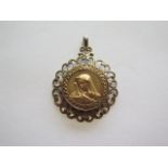 A 9ct gold medallion in a hallmarked 9ct gold pendant mount, 4cm tall, approx 6.9 grams, in good