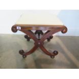 A 19th century rosewood cross frame stool in good condition, recently reupholstered, 42cm tall x