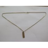 A hallmarked 9ct yellow gold ingot on a 9ct hallmarked box chain, chain 55cm long, approx 8.1 grams,