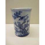 A Chinese 18th century blue and white bitong (brush pot), well decorated with a bird amongst foliage