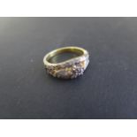 A gilt rough cut diamond ring, size L/M, in generally good condition