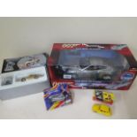 James Bond Aston Martin V12 Vanquish Rcertl.com, Corgi classic DB5 and Oddjob, Matchbox Silver Cloud