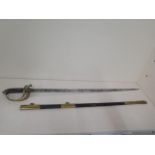 A Victorian naval sword and scabbard, sword length 89cm, some pitting and wear consistent with age