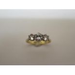 A 9ct hallmarked three stone (synthetic) ring, size O, approx 2.4 grams, in good condition