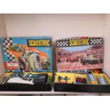 Two Scalextric boxed racing sets. Set 50 with 2 extra cars Ferrari C/62 and a Lotus RE C/63, and a