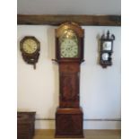 An 8 day mahogany and inlaid longcase clock with a 12" painted arch dial showing a girl and dog,