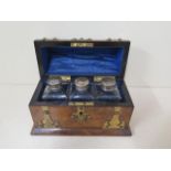 A burr walnut Victorian steeple top perfume casket with brass mounts, lined interior, with three