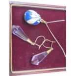 An enamel and silver gilt Easter egg pendant on a silver chain, pendant length 27mm including
