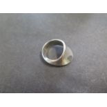 A Georg Jensen sterling silver ring designed by Vivianna Torun Bulow Hube, no 148, size N, in