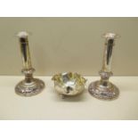 A pair of heavy, interior design silver on copper candlesticks, 20cm tall, plus a leaf decorated