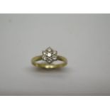 A hallmarked 18ct yellow gold seven stone diamond cluster ring, 0.50ct in total, ring size N, approx