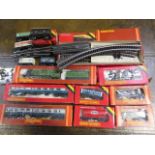 A Hornby 00 gauge railway, flying Scotsman loco, 0-6-0 tank loco, assorted rolling stock, track etc.