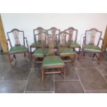 A set of eight 19th century dining chairs with vase shaped splats on square tapering moulded front