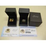 A GTV 9ct yellow gold moostone gents ring, size T, and a 9ct Tigers eye and white topaz gents