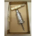 A Tomason type corkscrew, boxed with instructions in very good condition, some staining to box