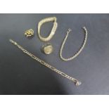 Two broken 9ct gold bracelets, another 9ct bracelet and a 9ct ring and a 15ct brooch, 9ct weight