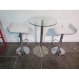 A glass top bar table, 91cm tall x 60cm diameter with two white laminated gas lift stools, some