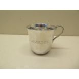 A Tiffany and company sterling silver christening mug with a full set of marks, 3.8 troy oz, 6cm