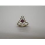 A vintage 18ct white gold marquise shape diamond and ruby ring, approx 0.80ct of diamonds, size K,