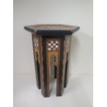 A Damascus mother of pearl inlaid side table, 47cm tall x 30cm wide, in generally good condition,
