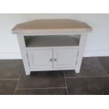 An ex display chalked oak corner TV unit