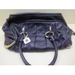 A Bally purple leather handbag with gilt metal hardware, 40cm wide, signs of light use, a little