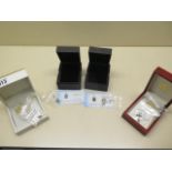 Four GTV 9ct gold pendants, 2 with fine gold chains, 2 with certificates and all still sealed