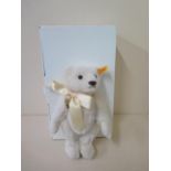 A Steiff Branbury Mint bear golden heart teddy bear, 25cm tall, with box and in good condition