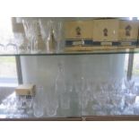 Lismore Waterford glass; a collection of drinking glasses and two decanters, all good condition with